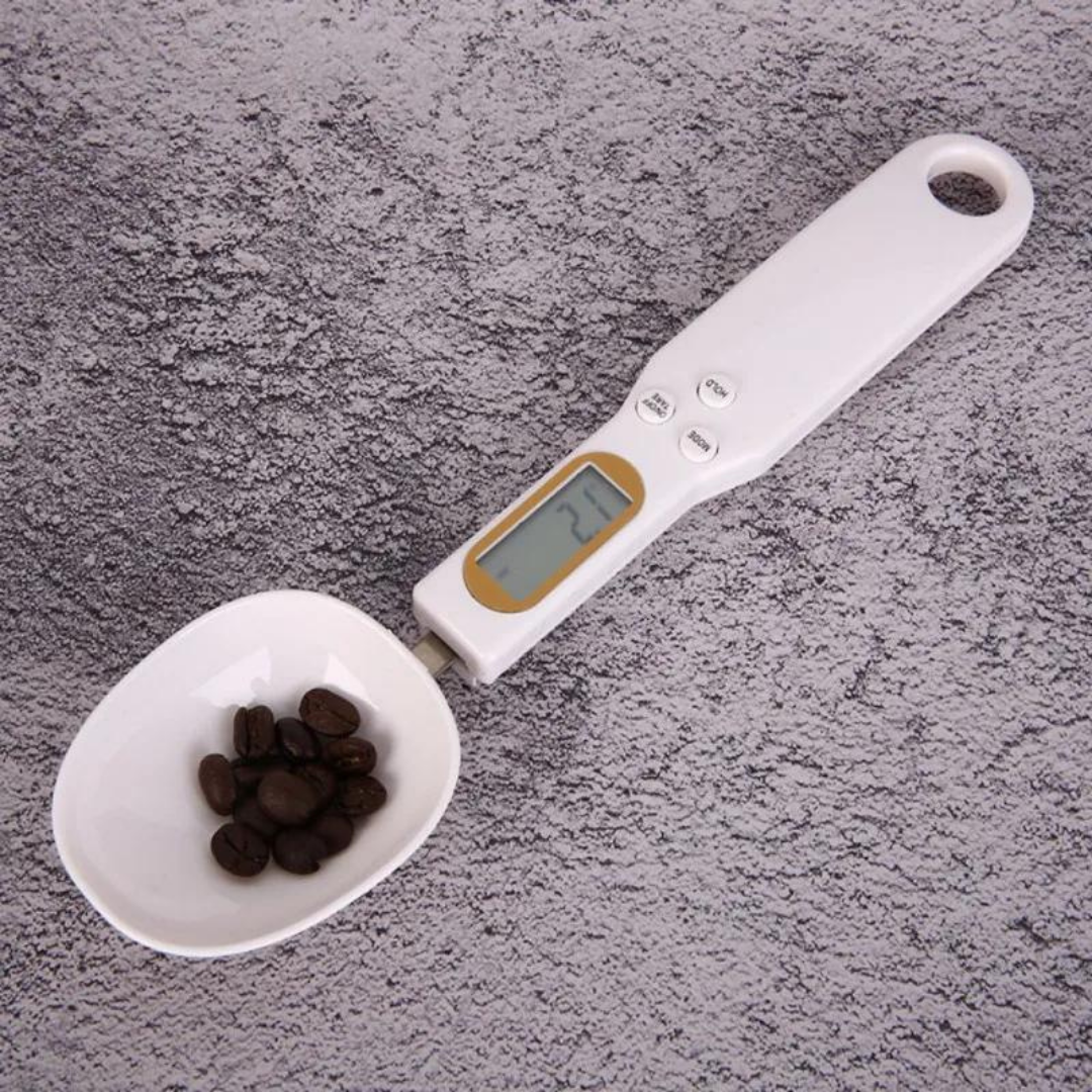 High-precision Digital Scale Measuring Spoon in white, featuring an LCD display for accurate measurement of food ingredients, ideal for both cooking and baking in a modern kitchen