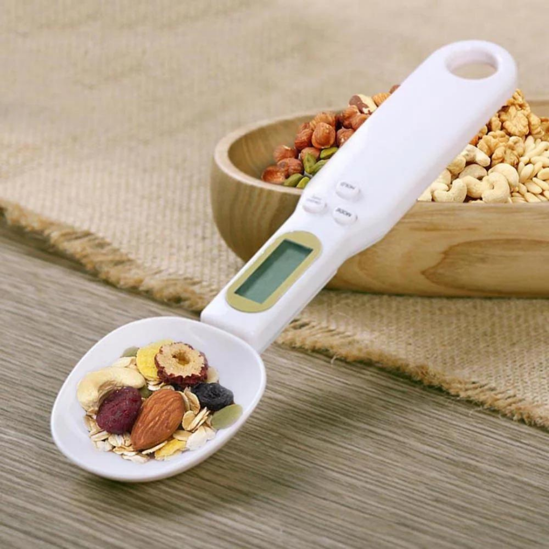High-precision Digital Scale Measuring Spoon in white, featuring an LCD display for accurate measurement of food ingredients, ideal for both cooking and baking in a modern kitchen